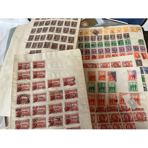 673 - A suitcase containing a large accumulation of world stamps mounted on pages in drawing book and 7 fi... 