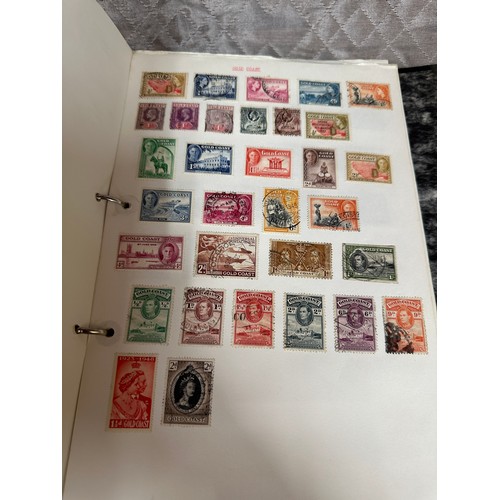 673 - A suitcase containing a large accumulation of world stamps mounted on pages in drawing book and 7 fi... 