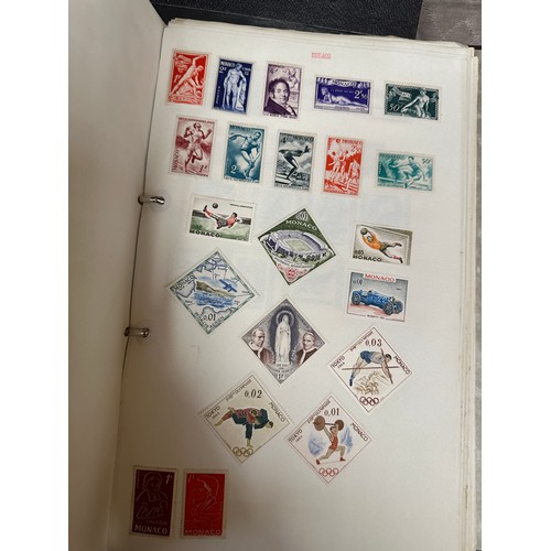 673 - A suitcase containing a large accumulation of world stamps mounted on pages in drawing book and 7 fi... 