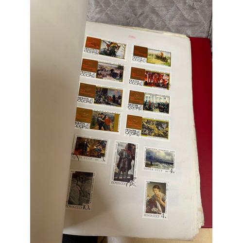 673 - A suitcase containing a large accumulation of world stamps mounted on pages in drawing book and 7 fi... 