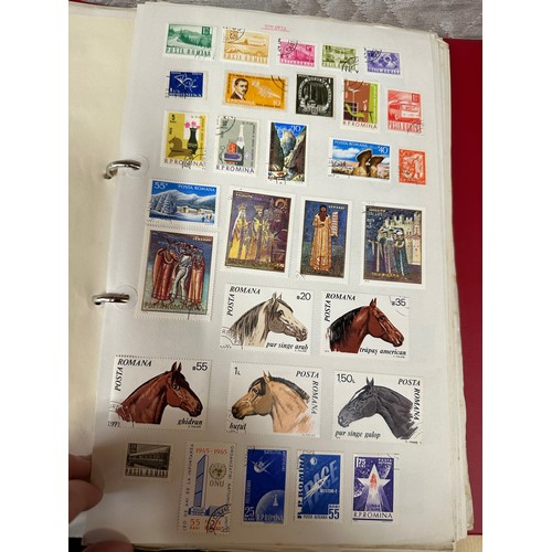 673 - A suitcase containing a large accumulation of world stamps mounted on pages in drawing book and 7 fi... 