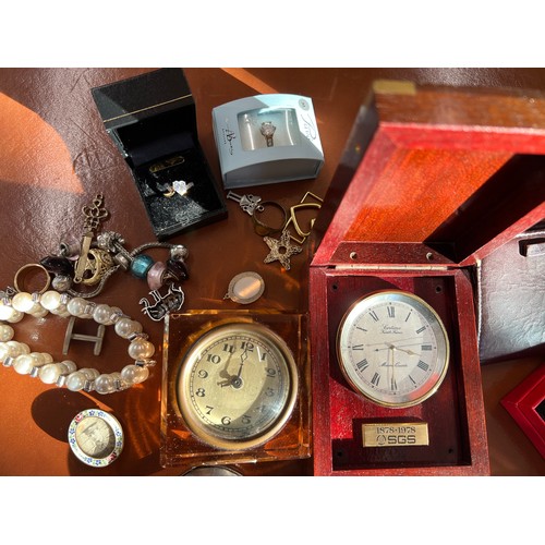 343 - A quantity of costume jewellery, pocket watch cases, clocks, miniature photograph frame etc.