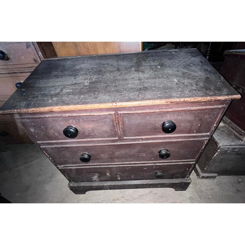 23 - A 19thC pine dough bin with sloping lift up lid. The front made to resemble a chest of two short ove... 