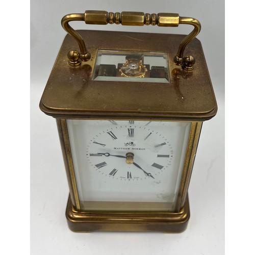 1273A - A brass cased Mathew Norman carriage clock with visible escapement. 13.5cm h.