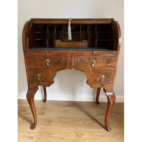 57B - A walnut roll top writing bureau on cabriole legs. 71 w x 46 d x 99cm h.