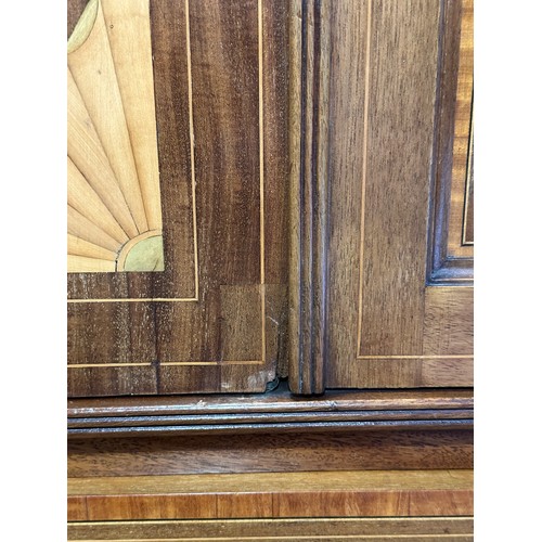 61 - An Edwardian mahogany inlaid bedroom suite bearing label for Harrods of London, comprising of a ward... 