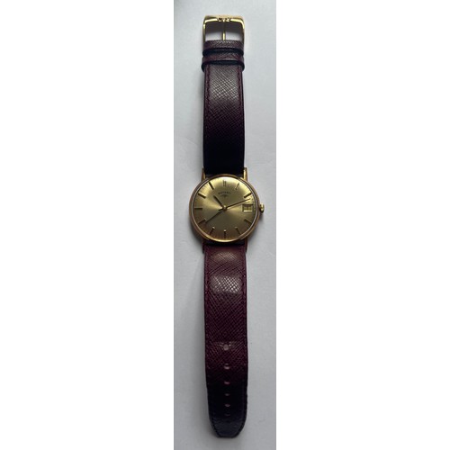 551 - A gold plated Rotary gentleman's wristwatch with date aperture on brown leather strap. Case 33mm. 

... 