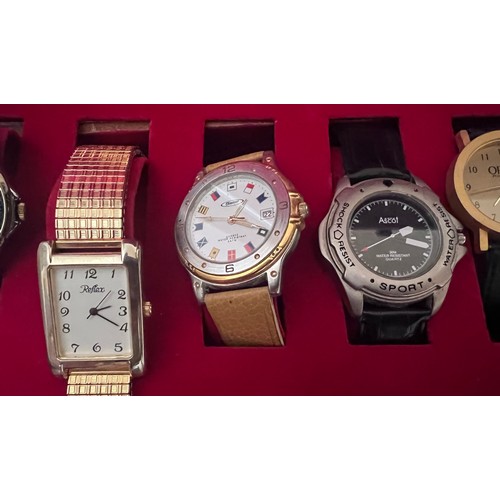 556 - A large collection of watches in case to include Vostok Komandirskie Submarine USSR, Accurist Shockm... 