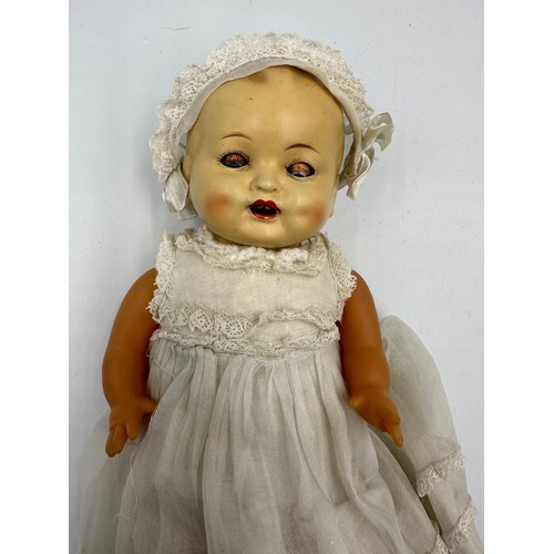 854 - A collection of three early 20thC bisque headed dolls of various sizes together with a doll's vintag... 