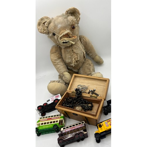 851 - A vintage well loved teddy bear, 48cm h, various Lledo Days Gone advertising vehicles and a music bo... 