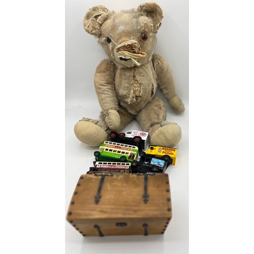 851 - A vintage well loved teddy bear, 48cm h, various Lledo Days Gone advertising vehicles and a music bo... 