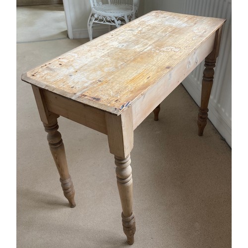 63 - A 19thC pine side table with two drawers to front. 97cm w x 43cm d x 74cm h.