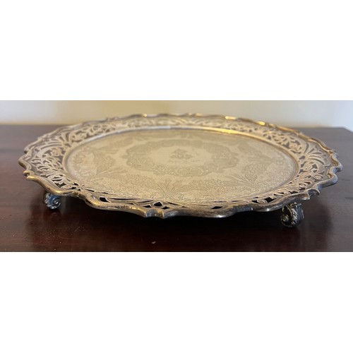 695 - Silver salver with pierced border and decorated centre with monogram and date July 17th 1907. 26cm d... 