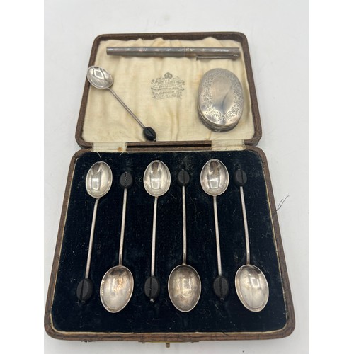 708 - Silver to include six boxed coffee bean teaspoons, Birmingham 1924, maker Hukin & Heath Ltd, a singl... 