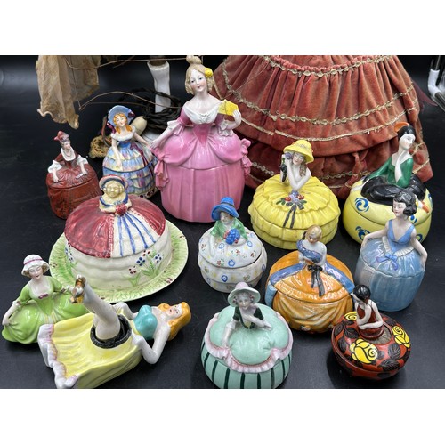 227 - A quantity of half dolls, one made into a lamp, others with lidded pots, one marked France, one mark... 