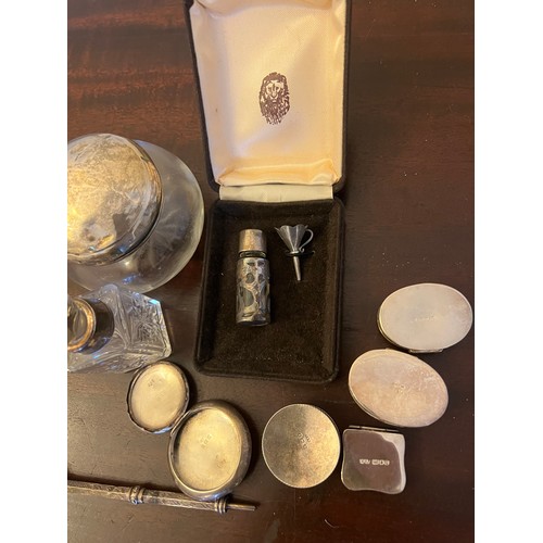 688 - Various items of silver and white metal marked .925 to include silver topped jar, scent bottles, fiv... 