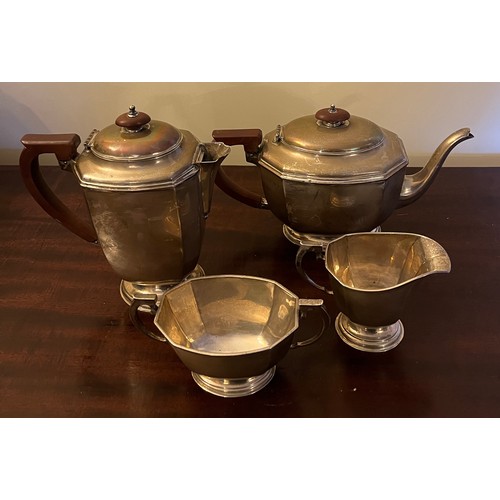 682 - A four piece silver tea service, Birmingham 1933, maker William Neal & Son. Total weight 1542gm. Tog... 