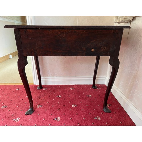 73 - An 18thC oak lowboy with trefoil pad feet. 74cm w x 47cm d x 65cm h.