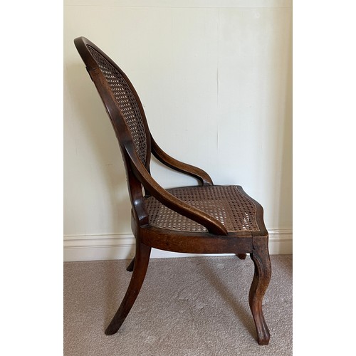 79 - A 19thC mahogany chair with cane back and seat. 82cm h to back.