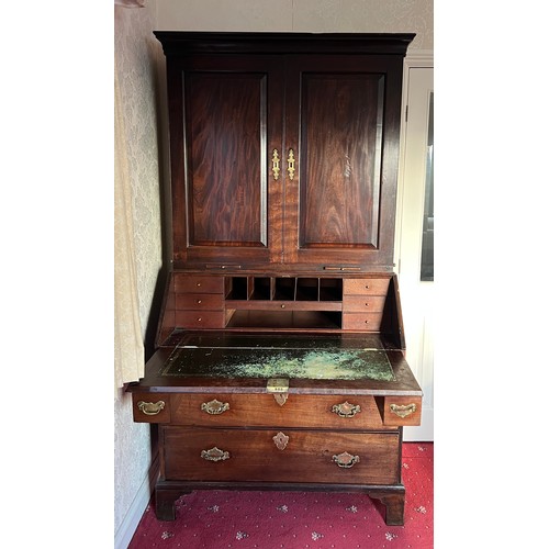 82 - An 18thC mahogany bureau bookcase with candle slides and original brass furnishings. 204cm h x 102cm... 