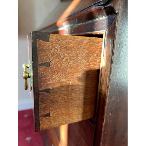 82 - An 18thC mahogany bureau bookcase with candle slides and original brass furnishings. 204cm h x 102cm... 