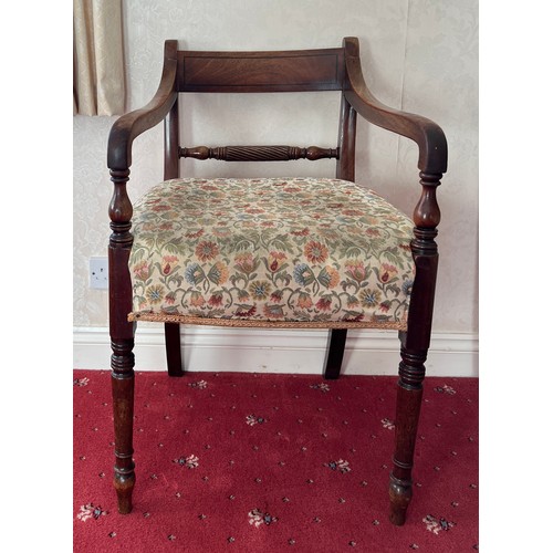 84 - A Georgian mahogany rope twist elbow chair. 57cm h to back.