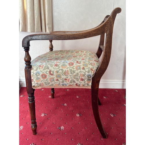 84 - A Georgian mahogany rope twist elbow chair. 57cm h to back.