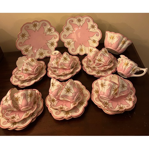 220 - A Wileman & Co. Foley china tea service comprising 12 cups, 12 saucers, 12 plates, 2 bread and butte... 