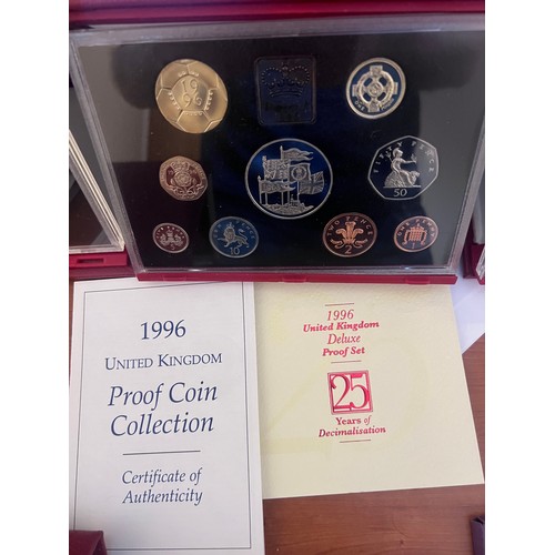 579 - Four cased sets of United Kingdom proof coins, limited editions issued by Royal Mint with accompanyi... 