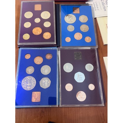 579 - Four cased sets of United Kingdom proof coins, limited editions issued by Royal Mint with accompanyi... 