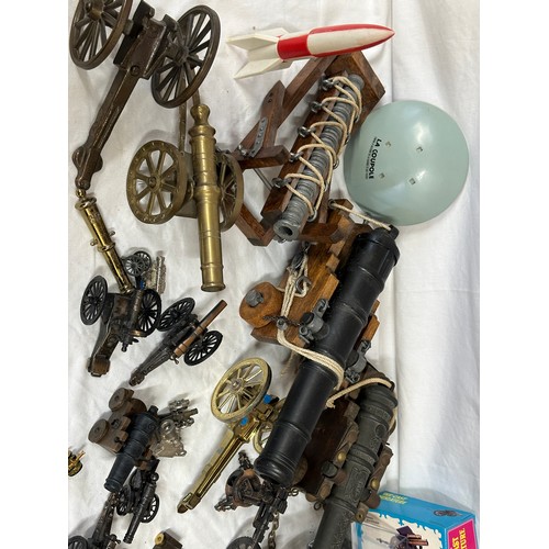 848 - An assortment of miniature canons and military accessories  to include Britains, Dinky, Depose and L... 