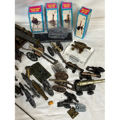 848 - An assortment of miniature canons and military accessories  to include Britains, Dinky, Depose and L... 