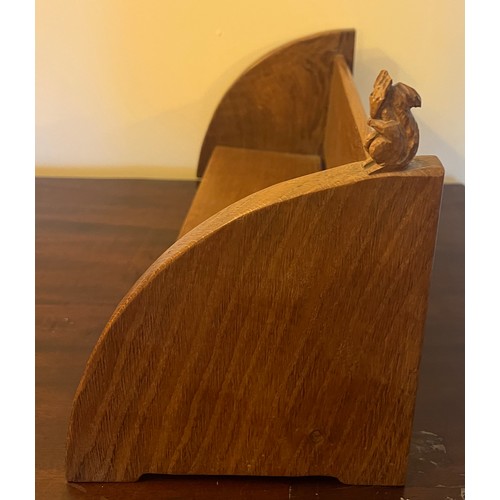 140 - A Wilf Hutchinson Squirrelman adzed oak book trough with signature squirrel to top. 45cm l x 19cm d ... 