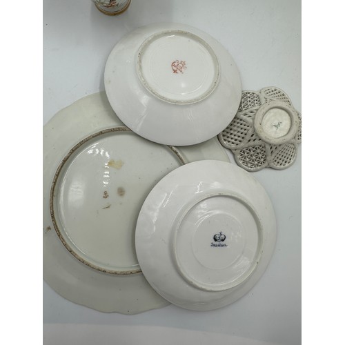 210 - A group of 19th and early 20thC ceramics to include a Samson plate with birds, Dresden cup and sauce... 