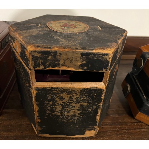 A wooden cased Lachenal concertina, the mahogany ends 16cm w with paper