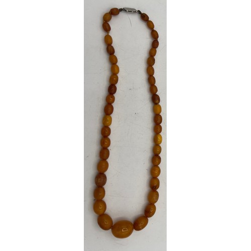 452 - Butter scotch amber bead necklace, length 48cm, weight 24gm.