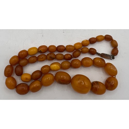 452 - Butter scotch amber bead necklace, length 48cm, weight 24gm.