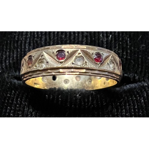 455 - A 9 carat gold eternity ring set with pink and clear stones. Size L, weight 2.2gm.