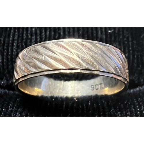 457 - A 9 carat gold wedding band, weight 2.6gm, size M.