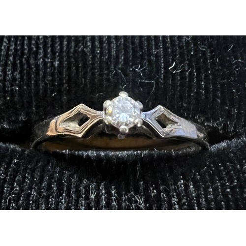 458 - A solitaire diamond ring set in gold, marks indecipherable. Size P, weight 1.2gm.