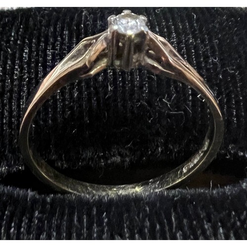 458 - A solitaire diamond ring set in gold, marks indecipherable. Size P, weight 1.2gm.