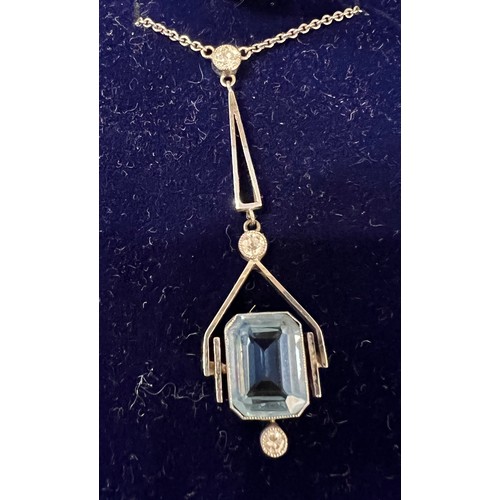 473 - An 18 carat white gold pendant set with aquamarine and diamonds. Length 48cm. Weight 4.4gm.