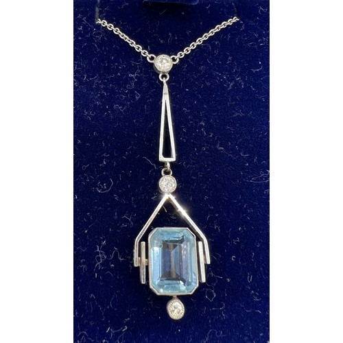 473 - An 18 carat white gold pendant set with aquamarine and diamonds. Length 48cm. Weight 4.4gm.