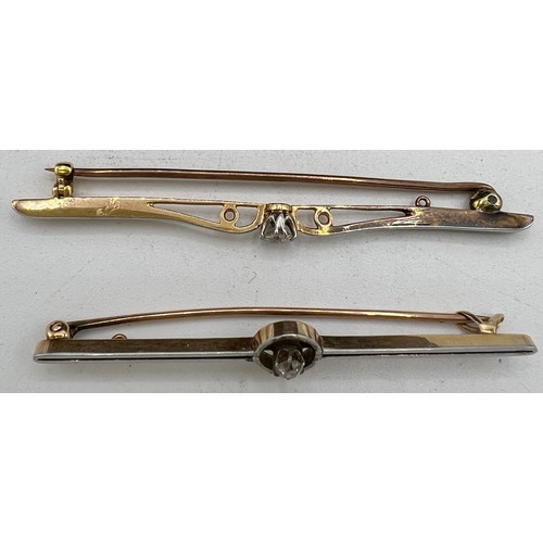 476 - Two bar brooches set with solitaire diamonds mounted in unmarked yellow and white metal. Total weigh... 