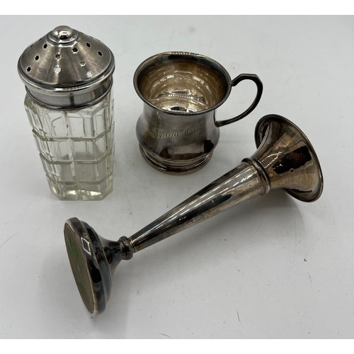 713 - Hallmarked silver to include specimen vase with weighted base, Christening mug and a silver topped s... 