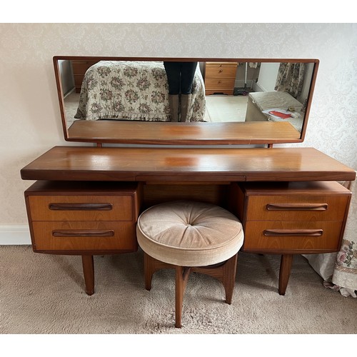 92 - Mid 20thC teak G Plan dressing table and stool. 153cm x 46cm x 118cm h to top of mirror.