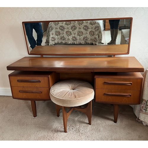 92 - Mid 20thC teak G Plan dressing table and stool. 153cm x 46cm x 118cm h to top of mirror.