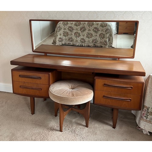 92 - Mid 20thC teak G Plan dressing table and stool. 153cm x 46cm x 118cm h to top of mirror.