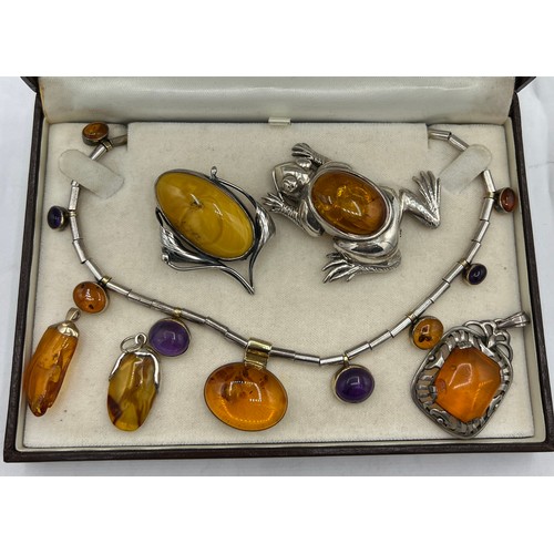 468 - Silver and amber choker style necklace, continental silver and amber pendant, Art Nouveau style ambe... 