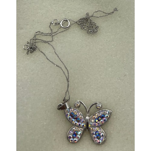 469 - A 9 carat white gold Swarovski butterfly pendant on fine 9 carat white gold chain.